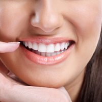 Why should I get orthodontic treatment - closeup of woman smiling