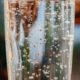 Close-up of bubbles rising in a glass of sparkling water